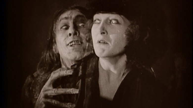 Mr. Hyde menaces a female victim 