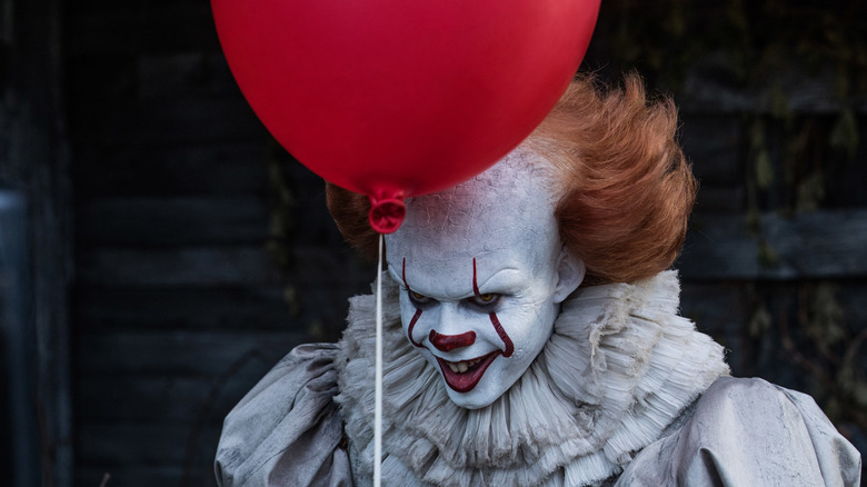 Pennywise in It with balloon