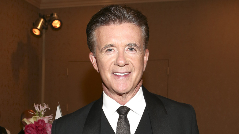 Alan Thicke smiles at the camera