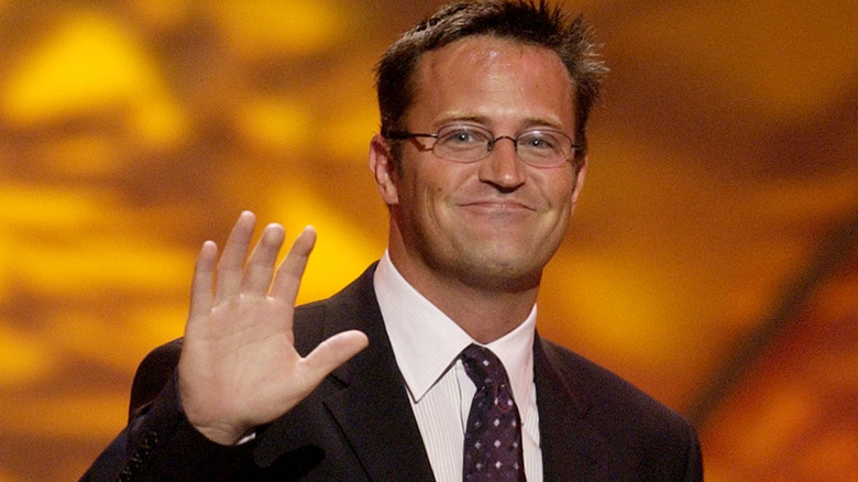 Matthew Perry waving