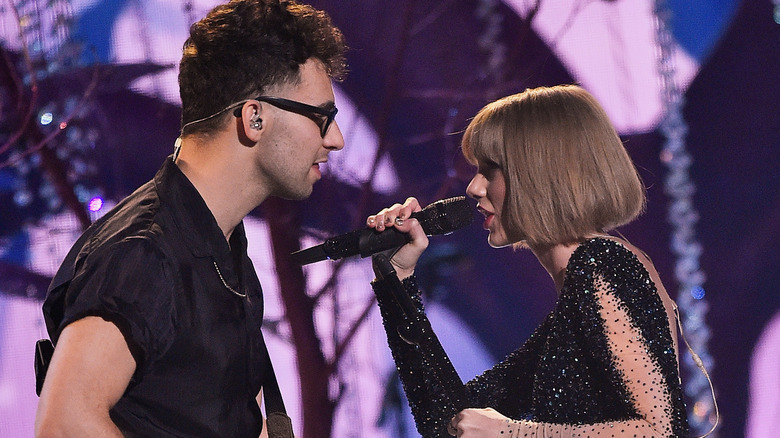 Taylor Swift and Jack Antonoff performing at the Grammys