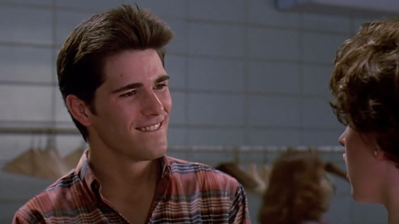 Michael Schoeffling talking to Molly Ringwald in Sixteen Candles