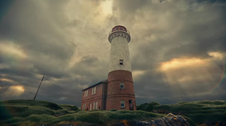 Clouds floating over a lighthouse