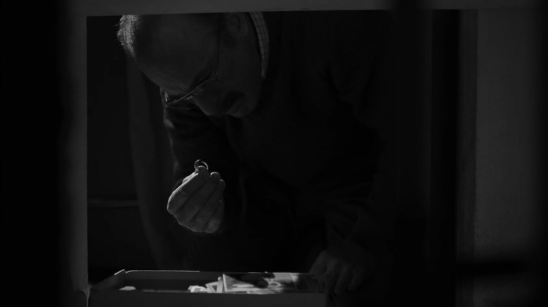 Bob Odenkirk looks at a ring