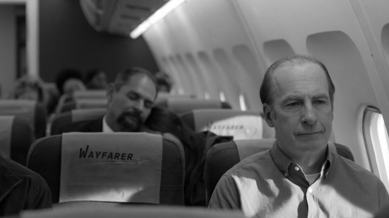 Bob Odenkirk sits in an airplane