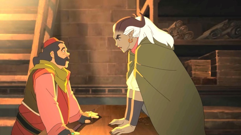 Qwydion speaking with a merchant