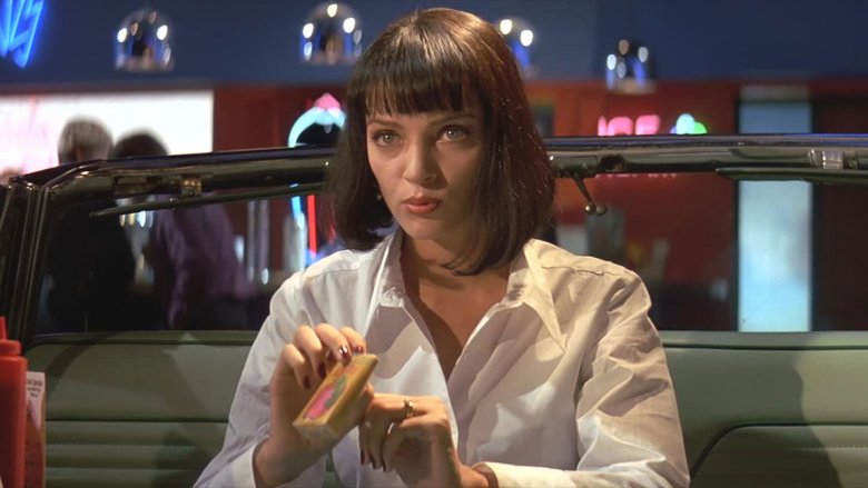 Mia Wallace smoking Red Apple cigarettes in Pulp Fiction