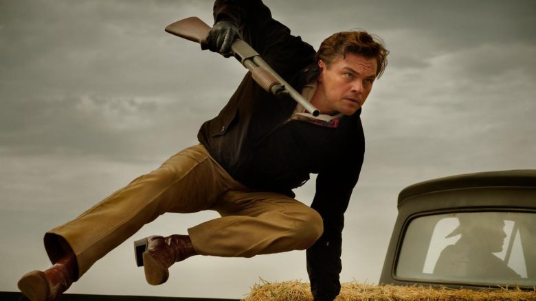 Leonardo DiCaprio leaping over a truck as Rick Dalton in Once Upon A Time In... Hollywood