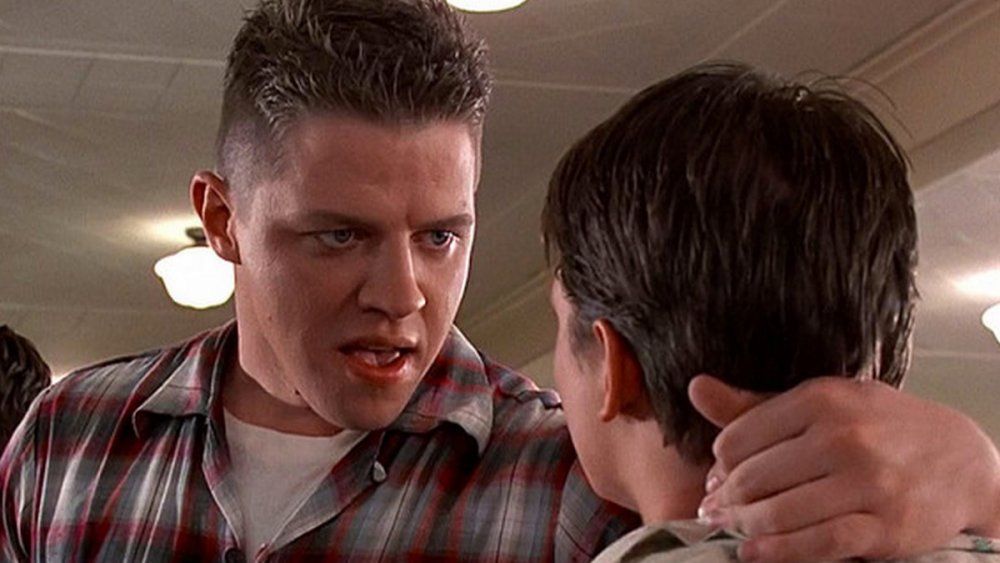 Thomas F. Wilson as Biff Tannen threatens Michael J Fox as Marty McFly in Back to the Future