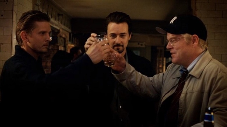 Barry Pepper, Edward Norton, and Philip Seymour Hoffman toast