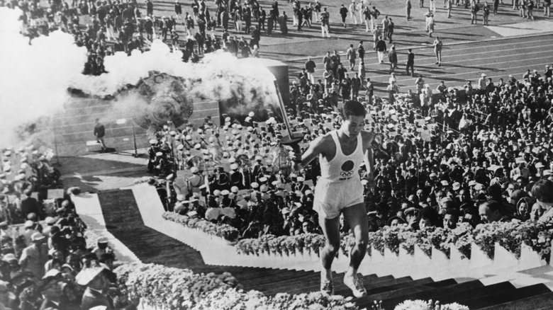 The torchbearing ceremony at the 1964 Tokyo Olympics