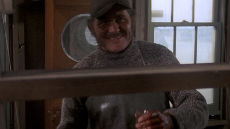 Quint smiling