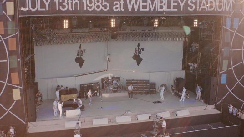 The band prepares to play on stage