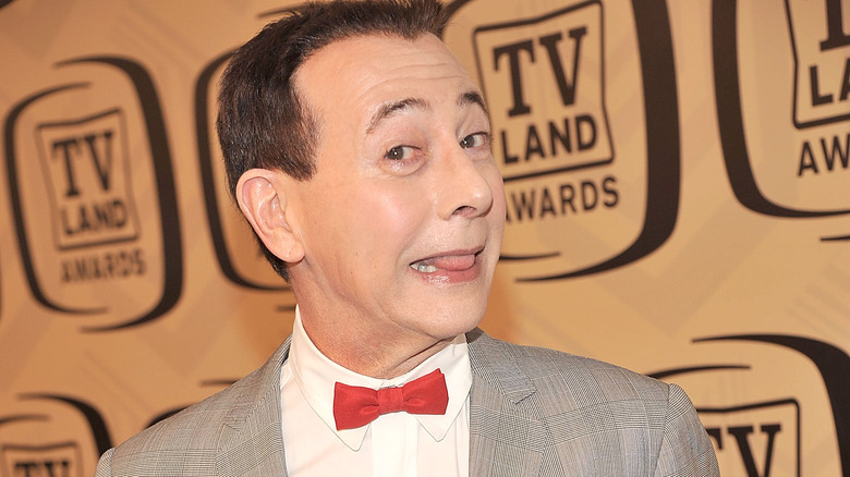 Pee-Wee Herman poking tongue out