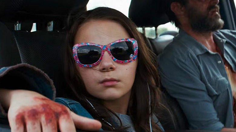 X-23 in car with Logan