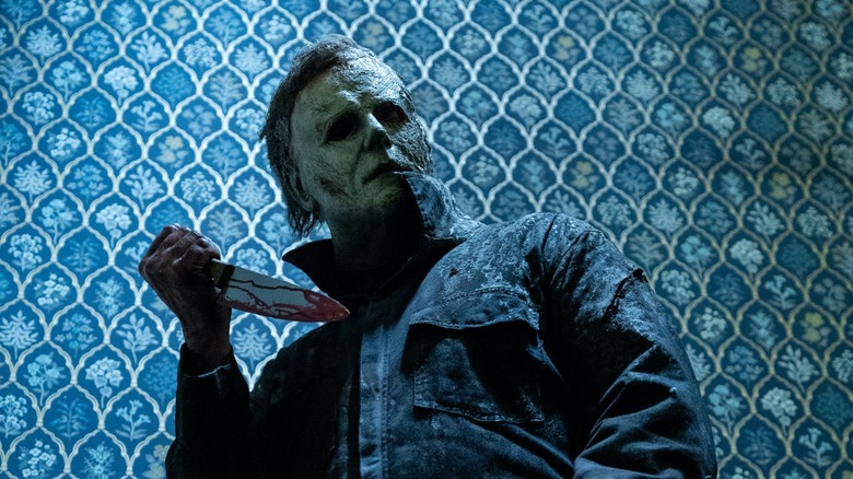 Michael Myers looking down holding knife