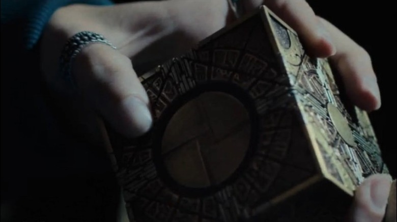 Riley holding puzzle box