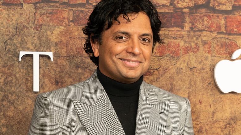 M. Night Shyamalan smiling