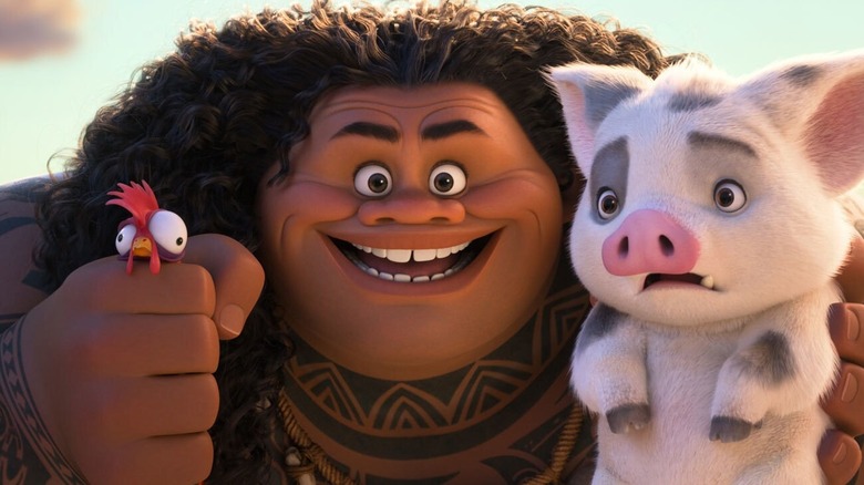 Maui holds Hei Hei and Pua in "Moana 2" (2024)