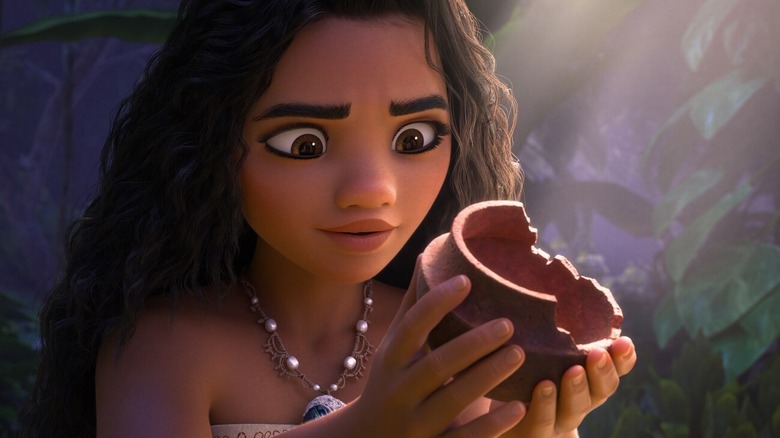 Moana holds a broken piece of pottery in "Moana 2" (2024)