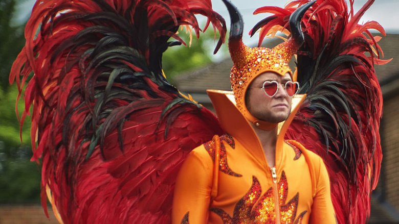 Egerton as Elton John in a devil suit in Rocketman