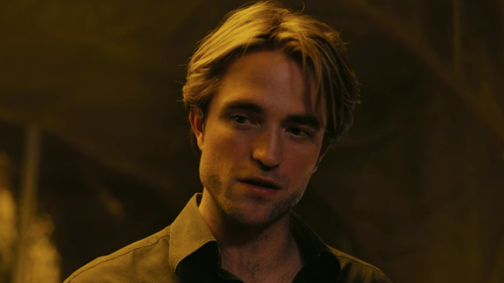 Robert Pattinson as Neil in Tenet