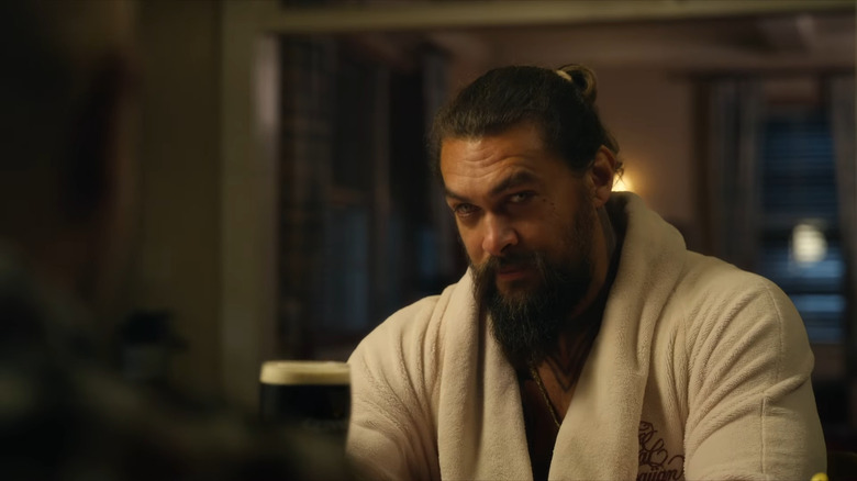 Aquaman in robe talking