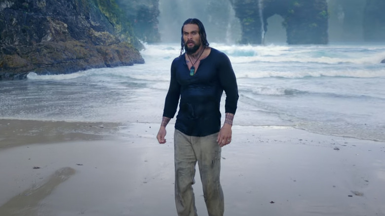 Arthur Curry standing on beach