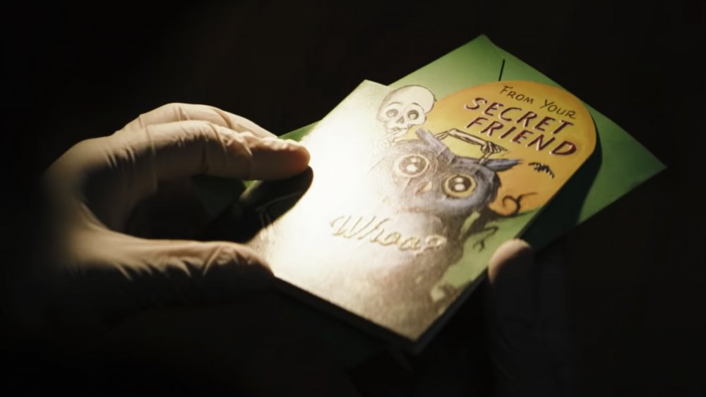 The front of the card from the Riddler in the Batman trailer