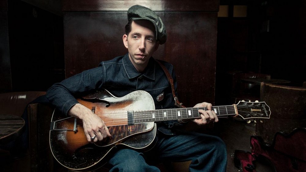 Pokey LaFarge with his guitar