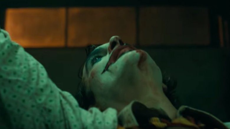 Phoenix as Joker with blood on his chin