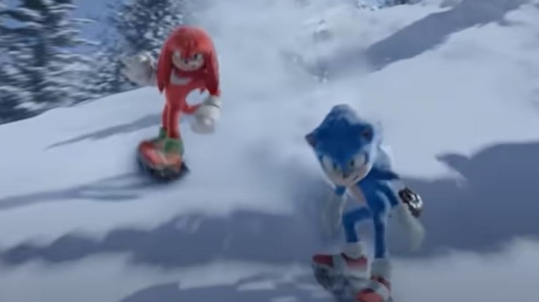 Sonic and Knuckles snowboarding down a mountain