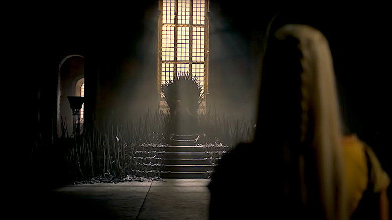 White haired person in front of Iron Throne