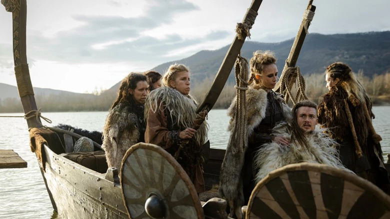 Uhtred escorted by wolf warriors