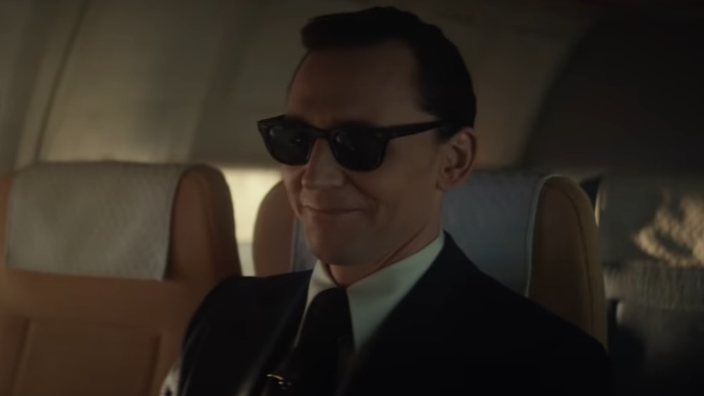 Tom Hiddleston as Loki, looking like D.B. Cooper, in Disney+'s Loki trailer