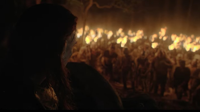 Orcs holding torches