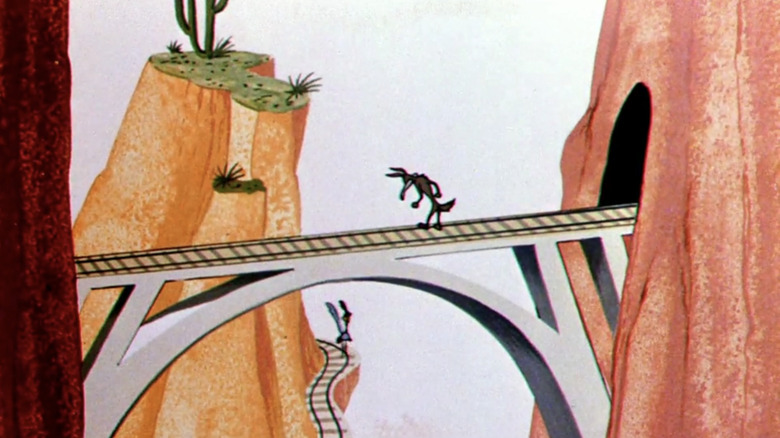 Wile E. Coyote and Road Runner on train tracks