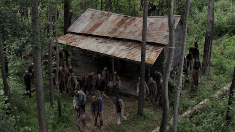 Walkers surround the Evil Dead cabin