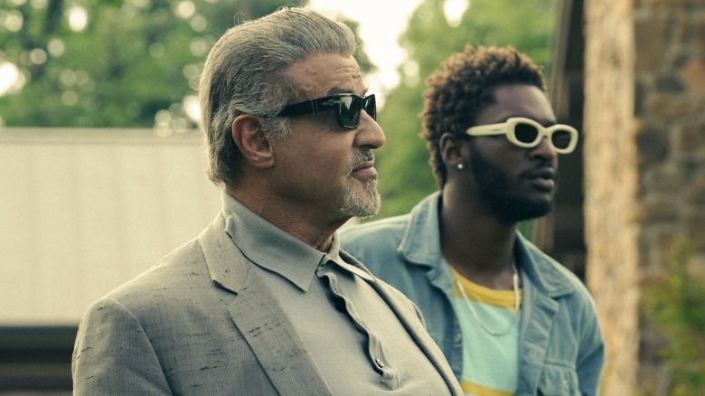 Sylvester Stallone, Jay Will wearing sunglasses