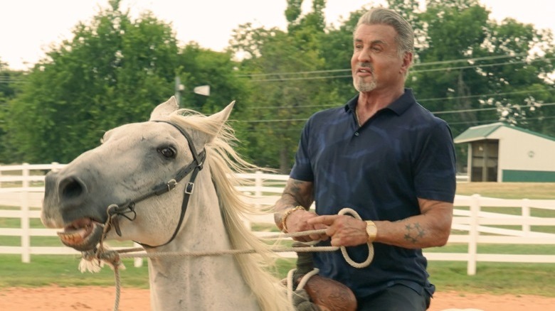 Sylvester Stallone riding horse