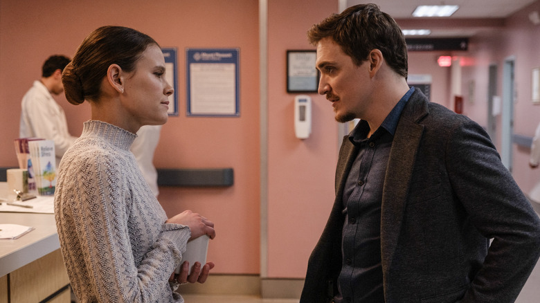 Joel and Rose standing in a hospital