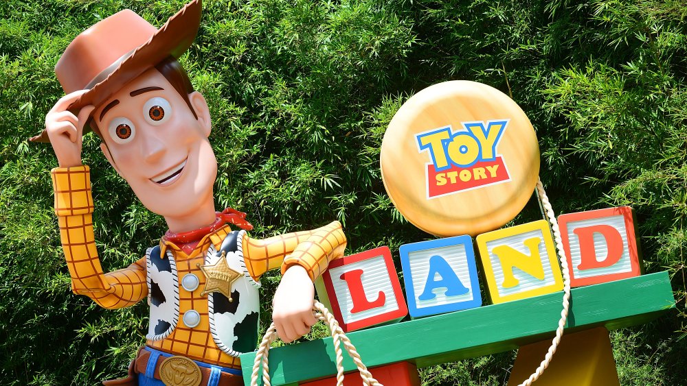 A Woody figure welcome's guests to Disney World's Toy Story Land