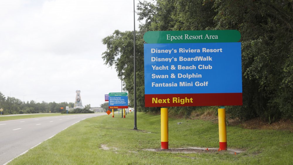 A sign directs drivers to Disney World's Epcot Resort Area