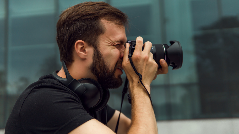 man with camera