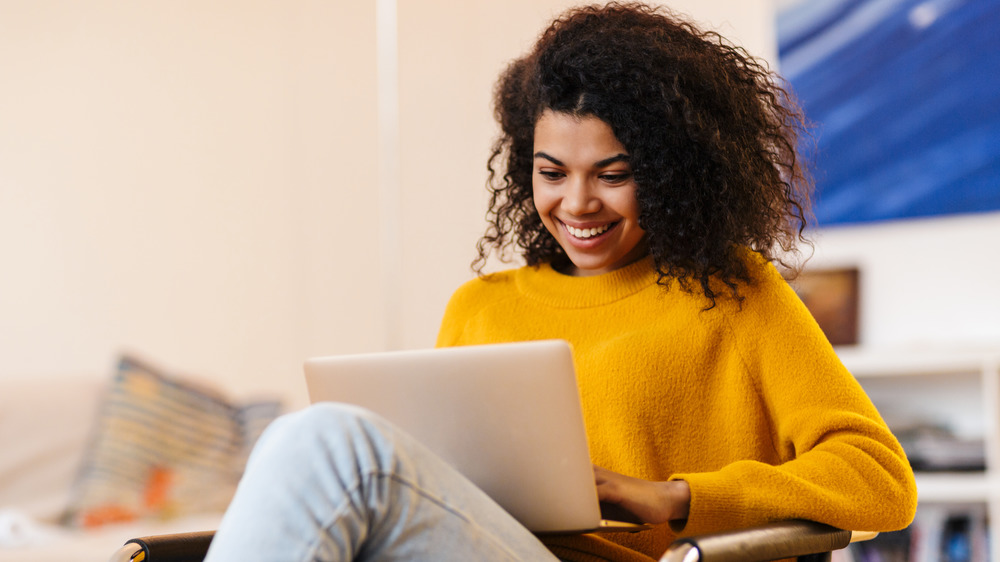 young woman with laptop