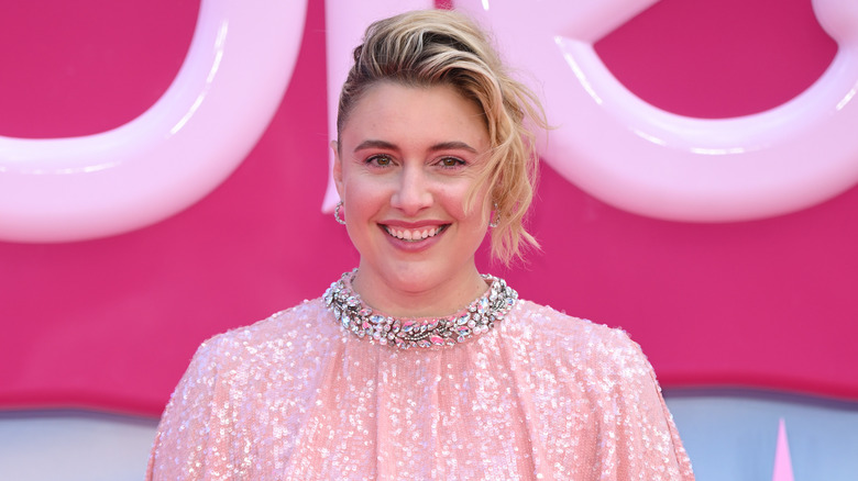 Greta Gerwig wearing pink dress