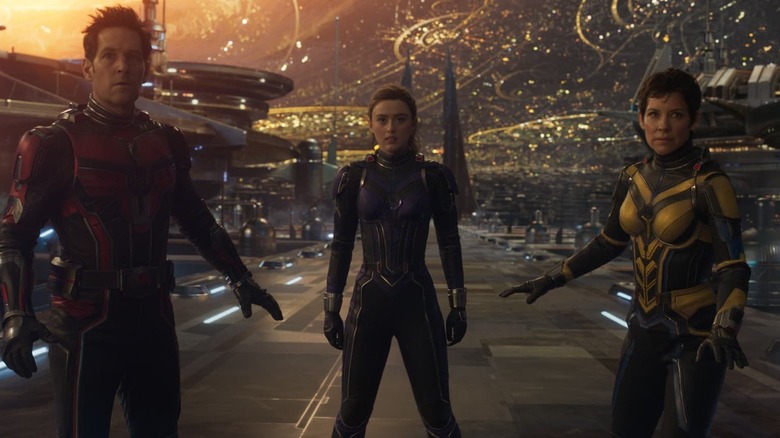 Paul Rudd, Kathryn Newton, and Evangeline Lilly looking worried in Ant-Man and The Wasp: Quantumania