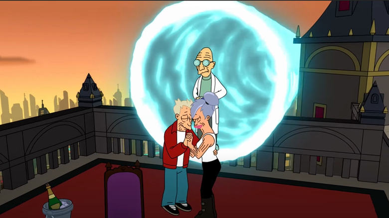 Older Fry and Leela hug