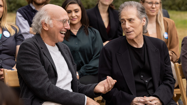 Larry David sitting next to Richard Lewis