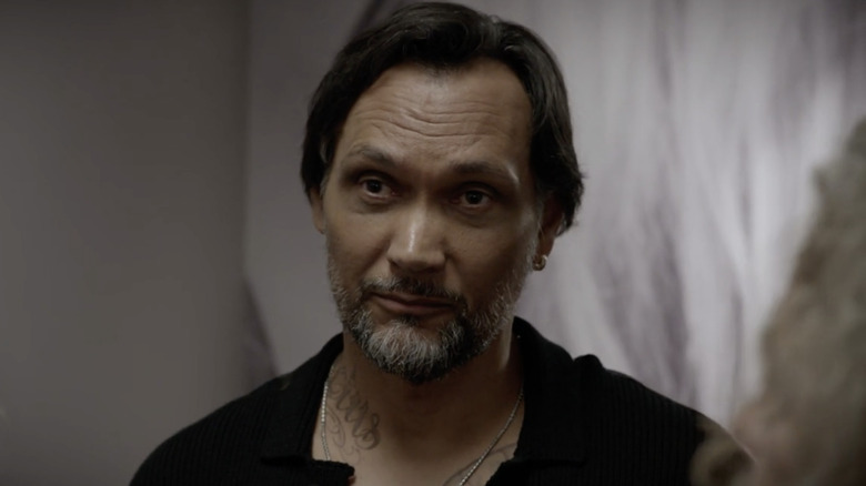 Nero Padilla wearing silver chain and black shirt